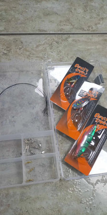 comes supplied with a clearview  tackle box, snaps,swivels, snap traces & a selection of lures.